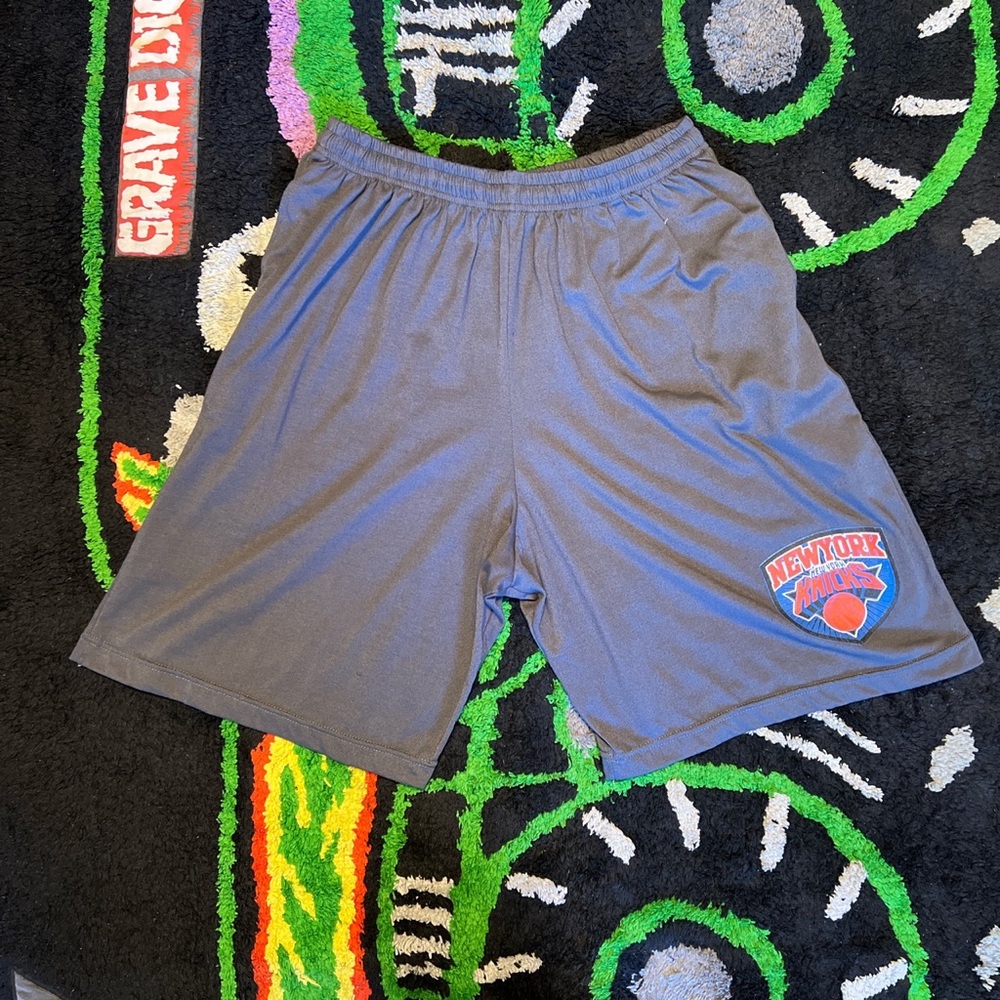 New York Knicks basketball shorts.